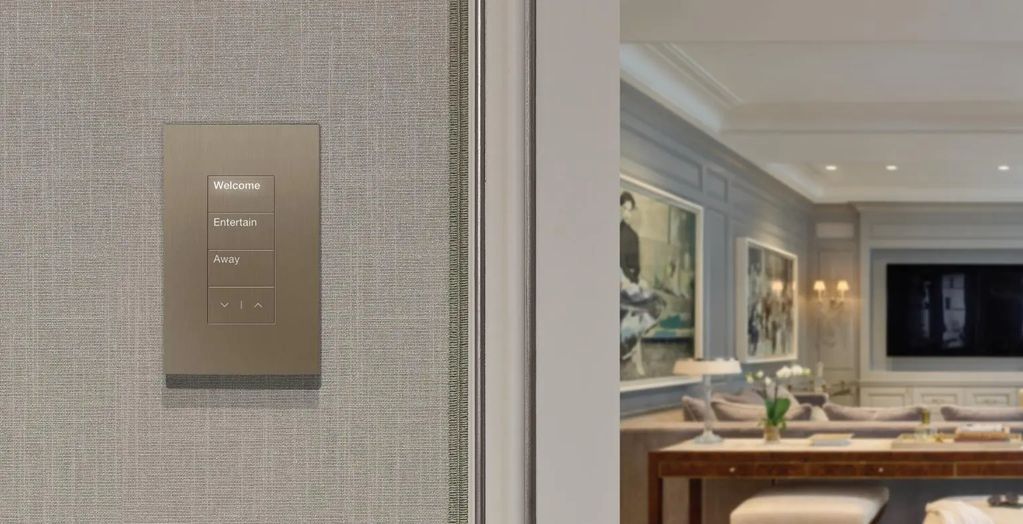 Smart home control panel on a textured wall.