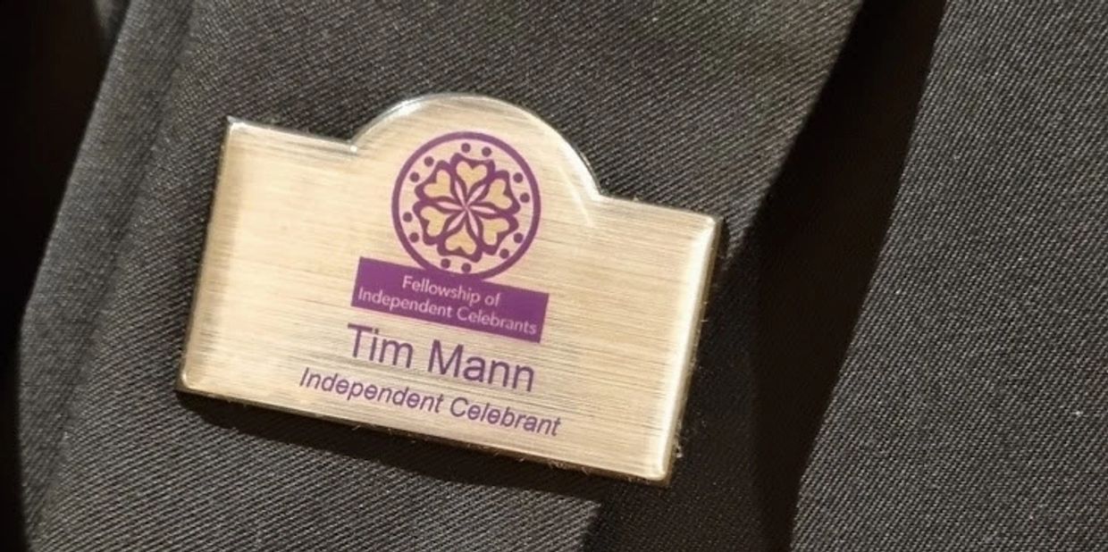Celebrants name badge in my name Tim Mann