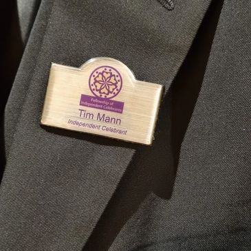 Tim's suit & name badge