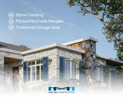 Traditional stone cottage with pitched shingle roof and blue shutters.