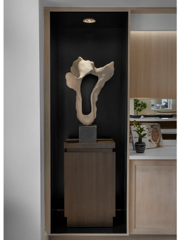 Timeless sculpture with ideal overhead display lighting.