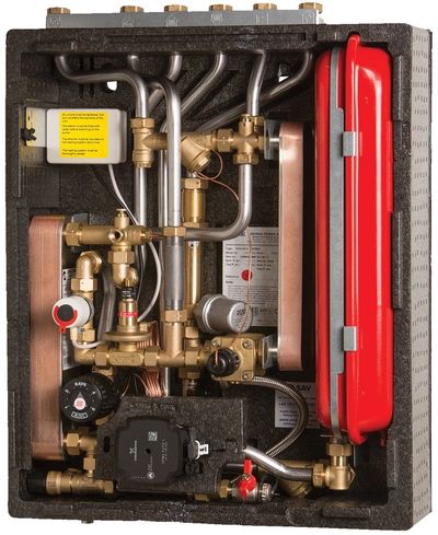 Internal view of a complex heating system with pipes and components.