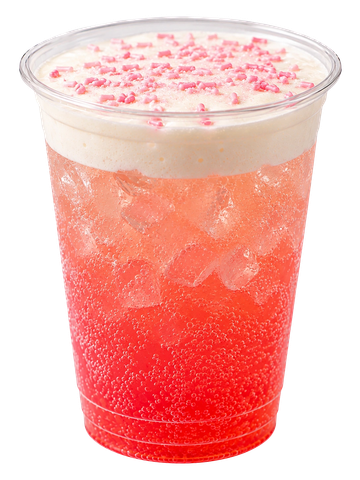 Icy pink sparkling drink with creamy foam and sprinkles.