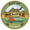 Official seal of Menifee city with natural landscape and mountains.