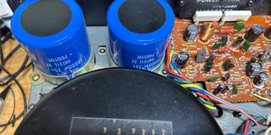 Close-up of electronic components and circuit board inside a device.