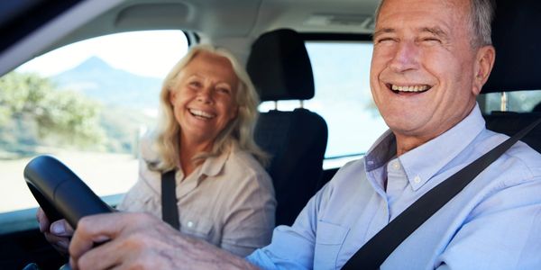 Older adults driving a car 