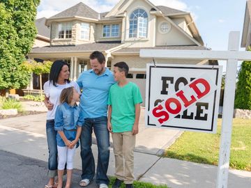 A family buying their first home.