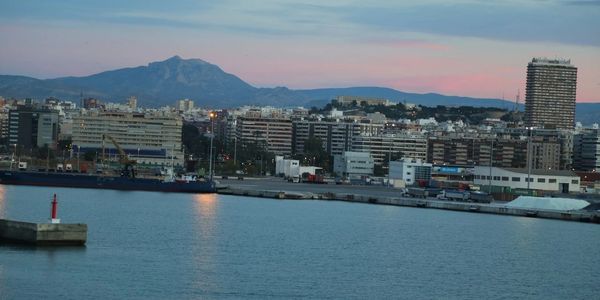 A large body of water with a city in the background.