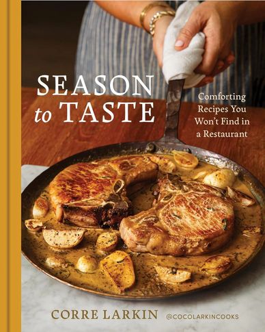 Cookbook cover featuring seared pork chops and roasted potatoes.