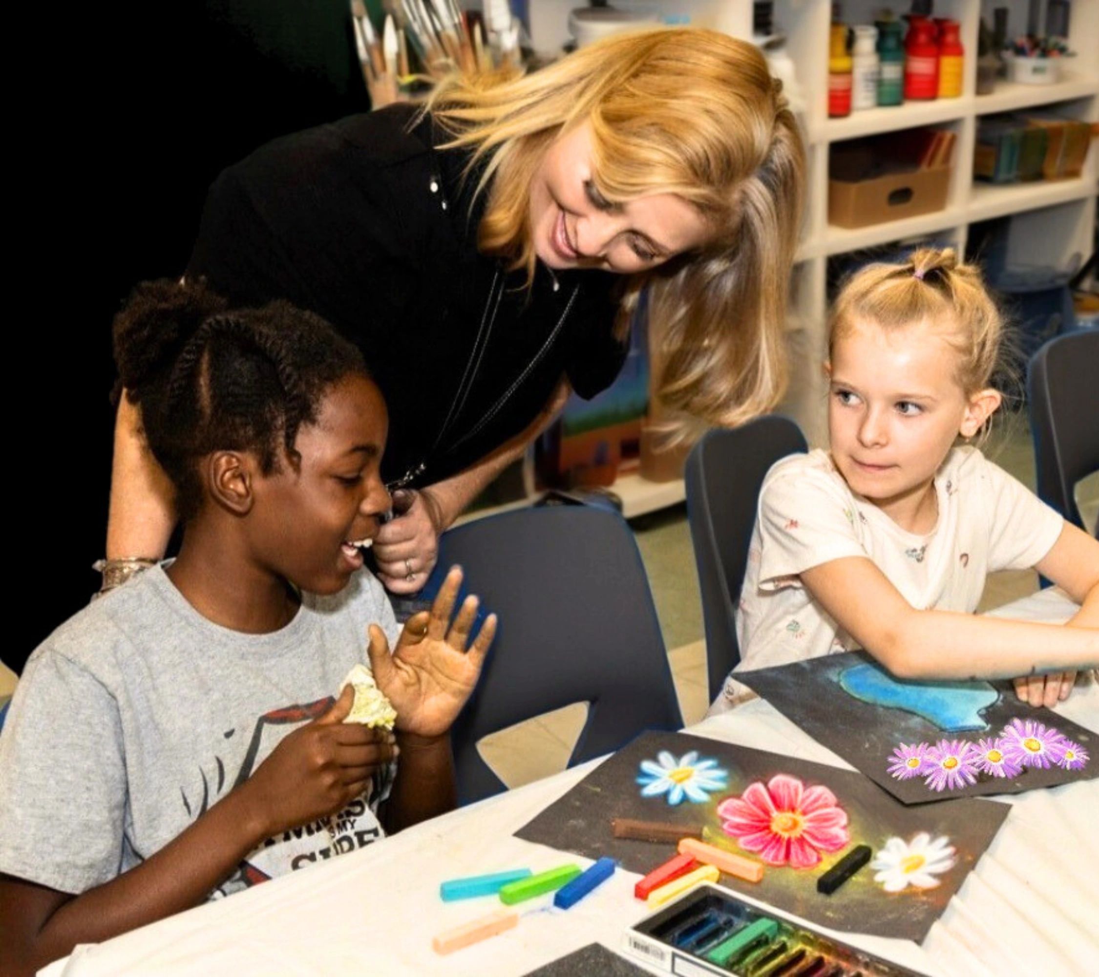 Kids doing art with Nancy.