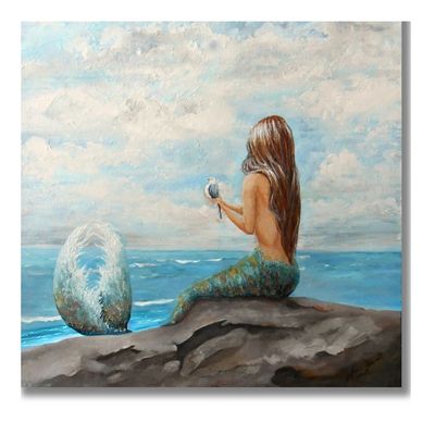 Mermaid on rock painting.