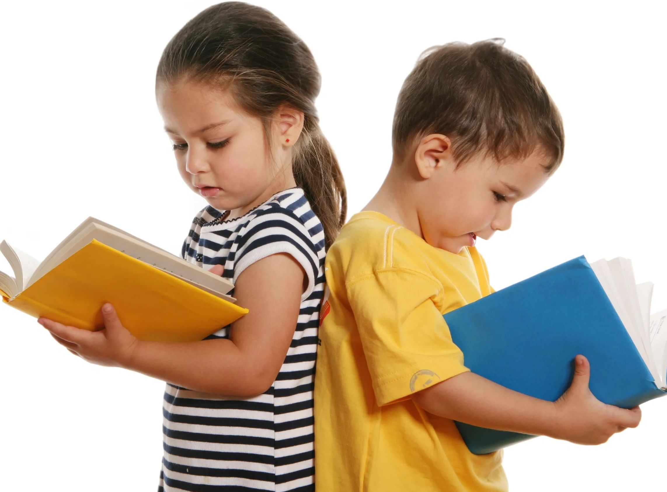 Two kids back-to-back reading books.