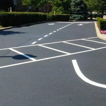 A parking lot with confusing and poorly marked lines.