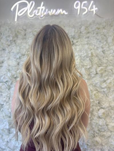 Blonde balayage with hair extensions at Platinum 954 Hair Salon Fort Lauderdale