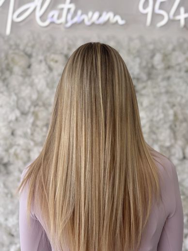 Blonde highlights with soft natural dimension at Platinum 954 Hair Salon Fort Lauderdale