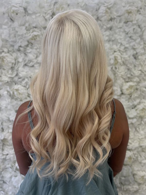 Platinum blonde hair seamless blend with extensions Platinum 954 Hair Salon Fort Lauderdale