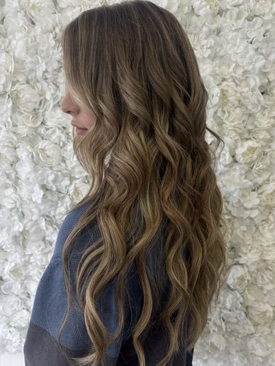Kovi volume genius weft extensions side view brunette Fort Lauderdale