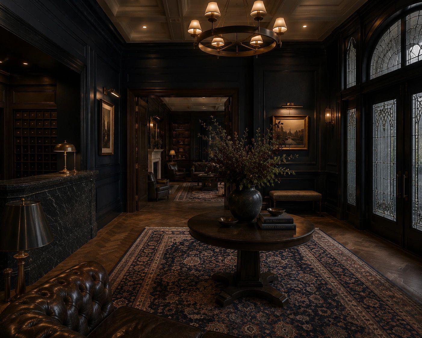 Luxurious dark-toned living room with elegant decor and warm lighting.