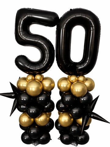 Black and gold balloons shaped as the number 50 for a celebration.