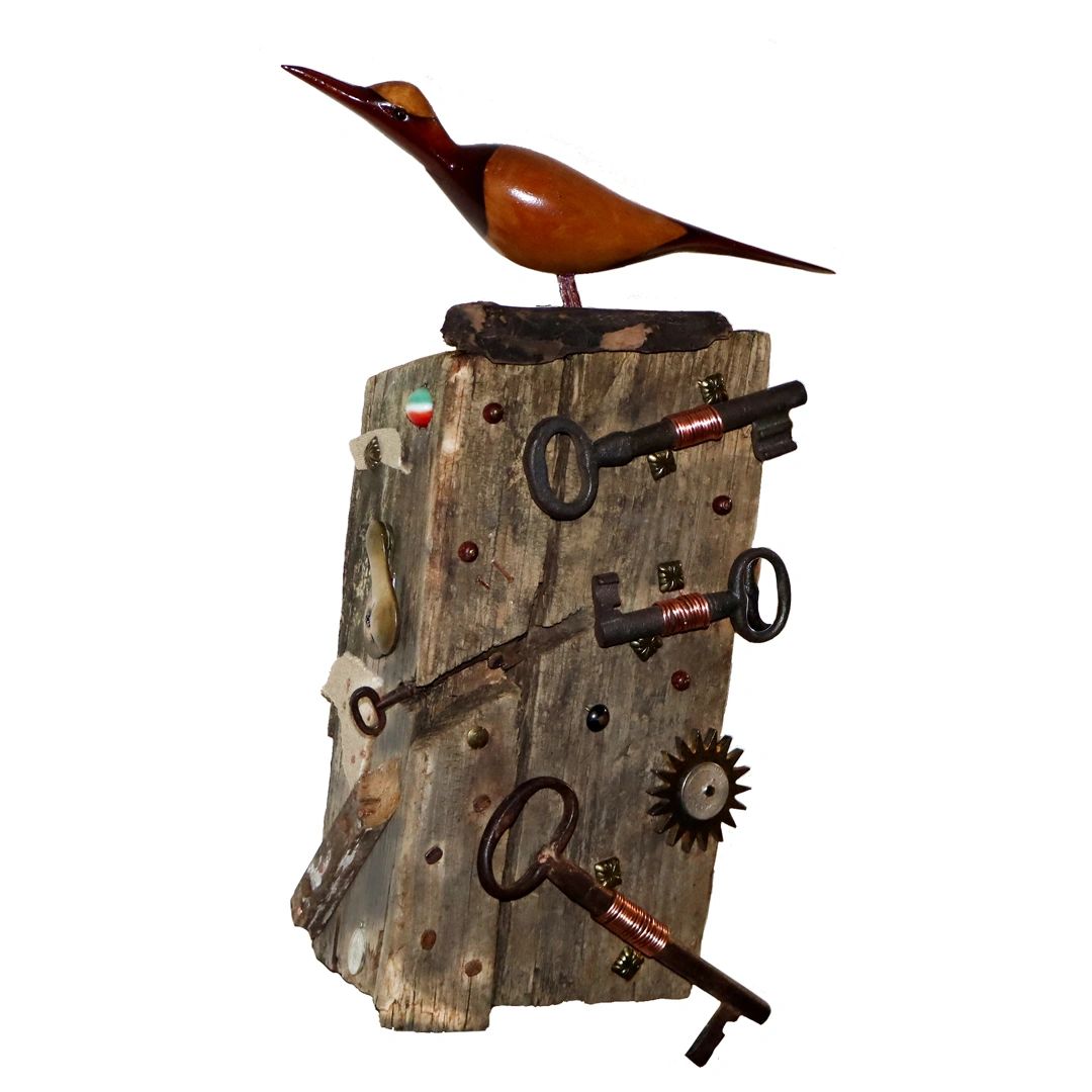 An assemblage piece with attached aged objects; including: old keys, wood and nails.  Chicago artist