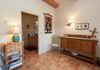 Looking in to the bathroom from the main room.  More storage bedside and in the sideboard to help keep your vacation space uncluttered & stress free.