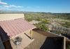 Bird's eye view of courtyard and the owner's veggie/herb gardens in the adjacent enclosure.  Nina will be out watering early mornings and/or evenings.