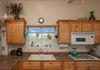 The garden window over the sink provides a restful view on to National Monument property while washing dishes.  Wildlife visits frequently.