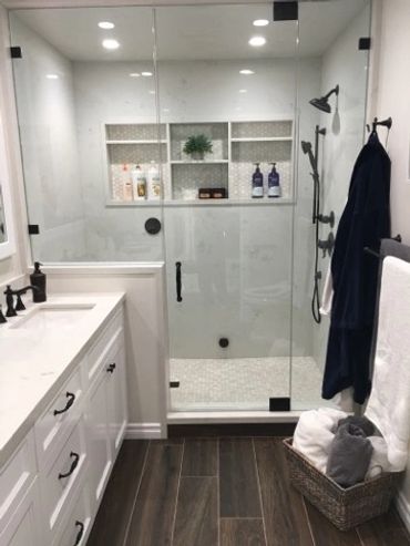 Beautiful white shower with custom glass enclosure