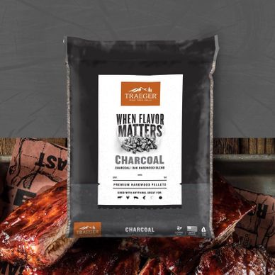 Bag of Traeger charcoal pellets for smoking and grilling.