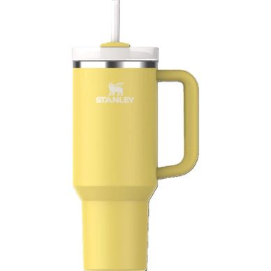Yellow Stanley travel mug with handle and straw.