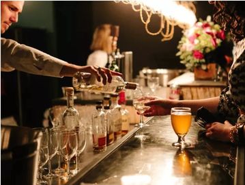 Bartender pouring a drink