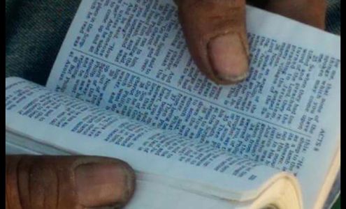 Man reading a bible