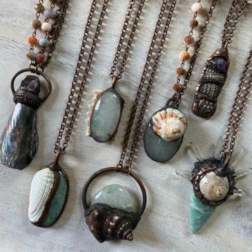 Handmade necklaces with natural stones and shells.