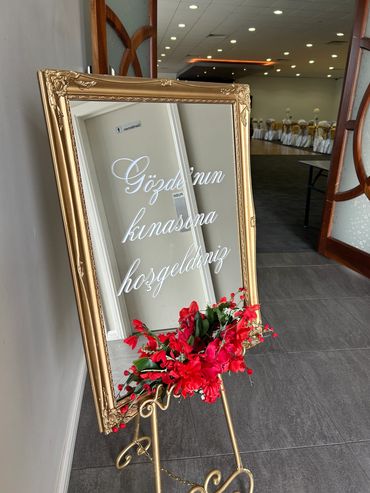 kina welcome sign decal on mirror