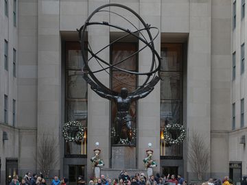 Rockefeller Center is a large complex consisting of 19 commercial buildings covering 22 acres between 48th Street and 51st Street in Midtown Manhattan, New York City. Art Deco Building, Radio City Section. The Complex is also famous for its annual lighting of the Rockefeller Center.