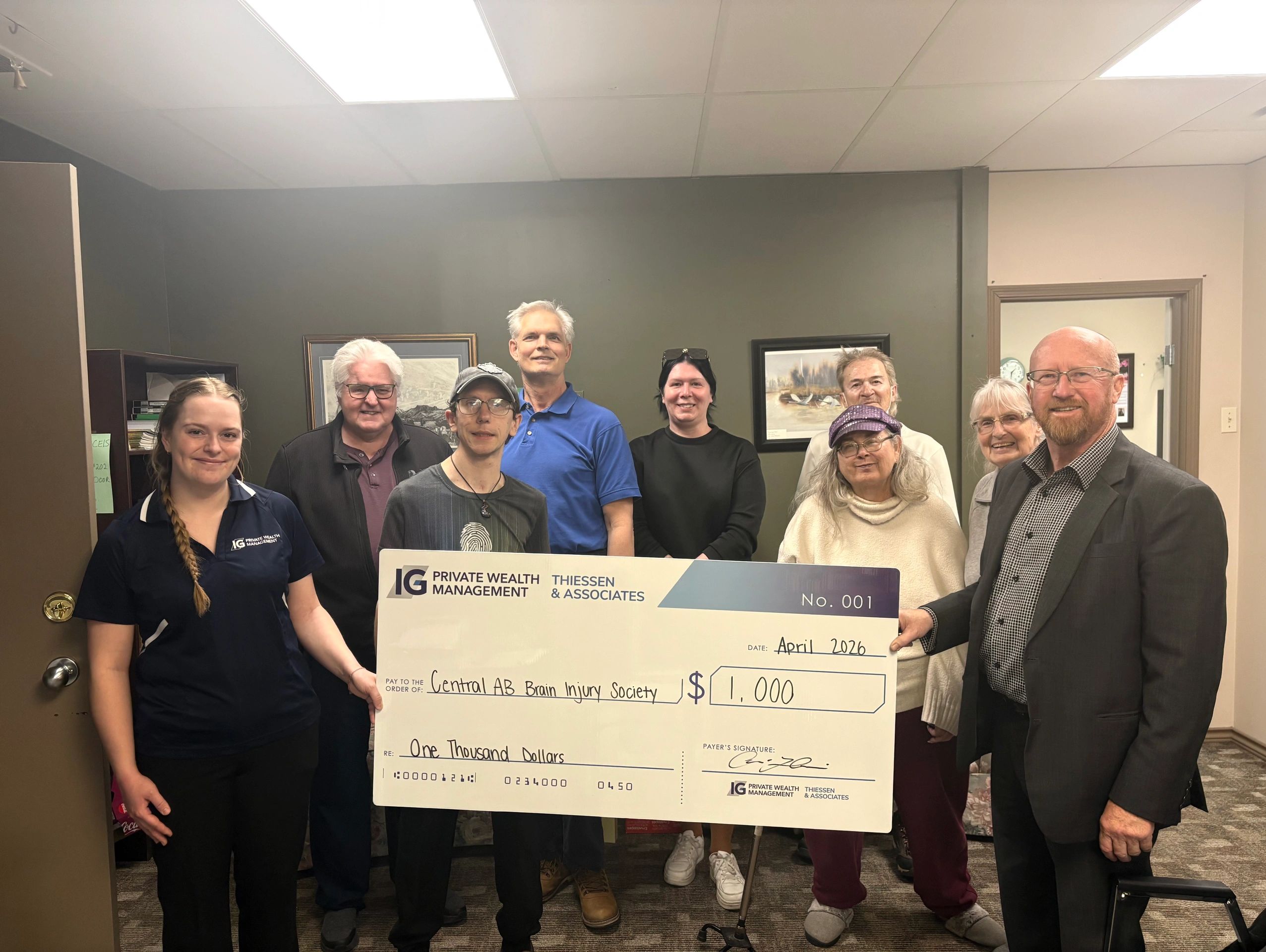 IG private Wealth Management presented a cheque to CABIS brain injury support group for expenses  