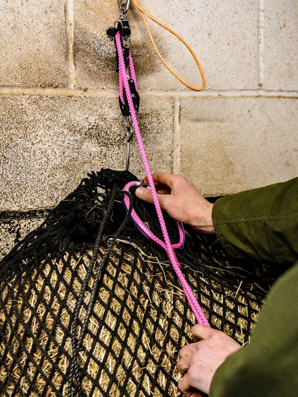 Man storing the EquiJack handle out of the way