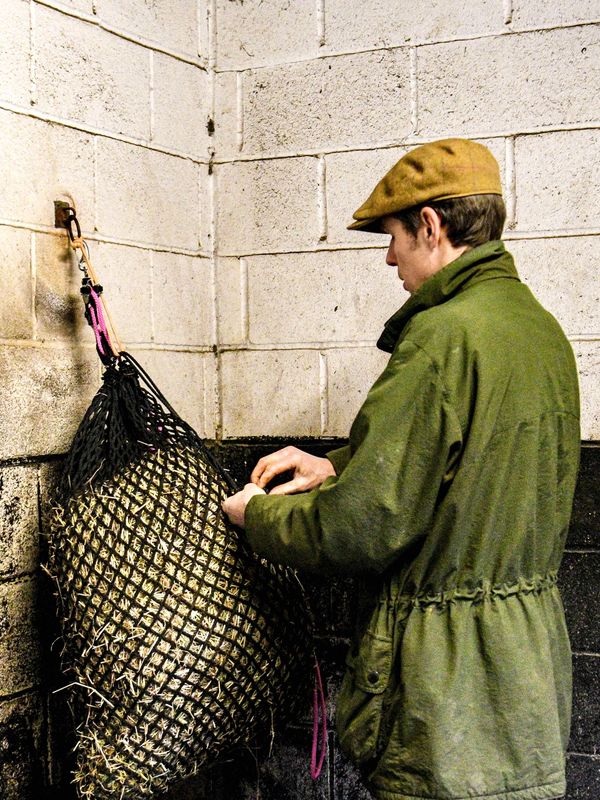 Man tying a haynet