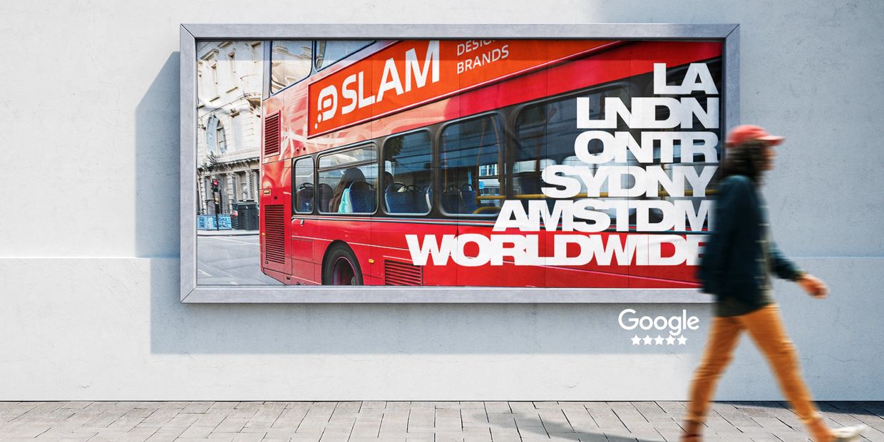 A gritty street scene showing a man walking past a Slam Creative Bill Board poster. 