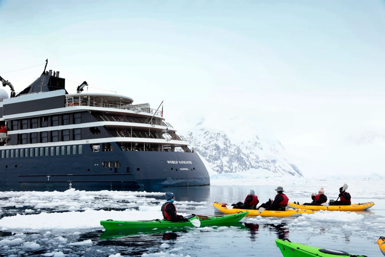 Kayaking the icefields of Antarctica.