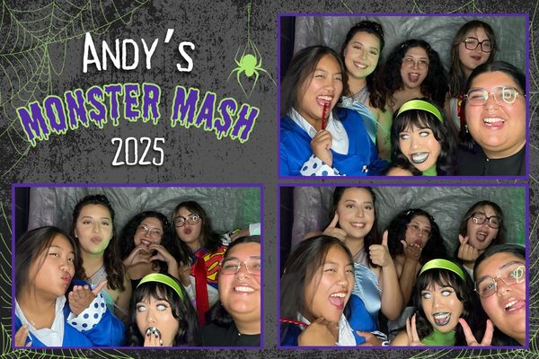 Group of friends having fun at Andy's Monster Mash 2025 photo booth.