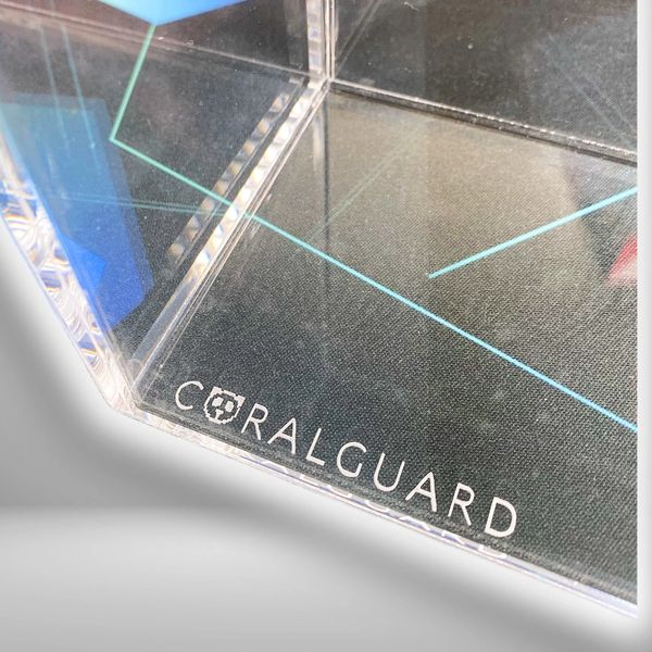 Close-up of a clear acrylic product labeled CORALGUARD.