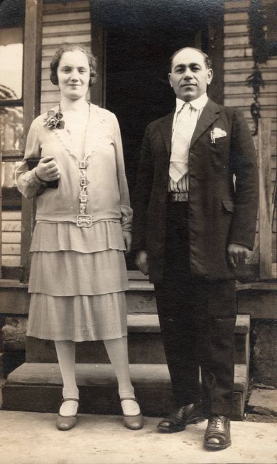 1927 Anna and Sam Conte in front of their row house rental at 26 Witherspoon Lane