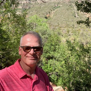 Barry Duncan outside in Sedona, Arizona while attending the Myofascial Release III course.