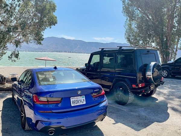 BMW 330i and Mercedes Benz G-Wagon