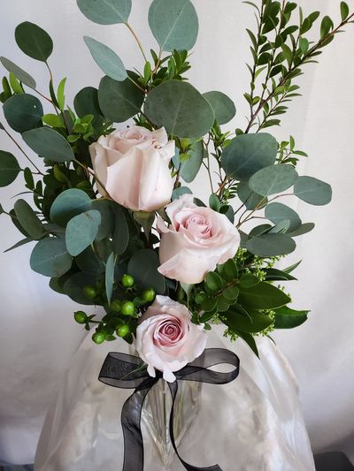 3 pink roses with Eucalyptus branches floral bouquet 