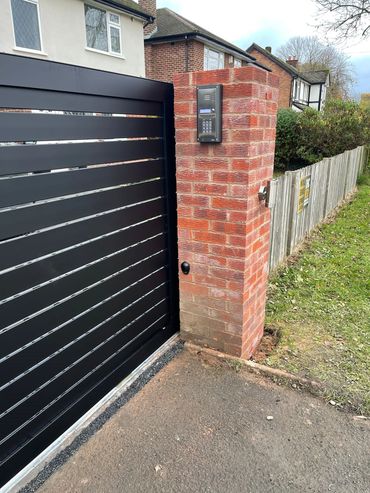 black sliding automated gate 