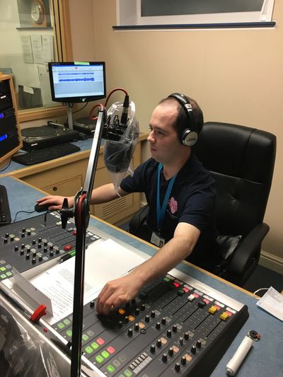 Volunteer Sean Smith in the studio