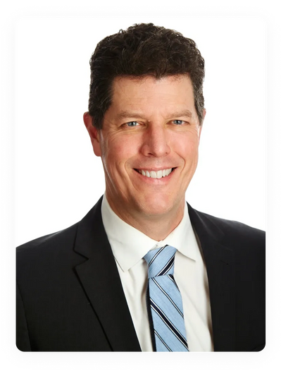 A headshot business photo of the founder.