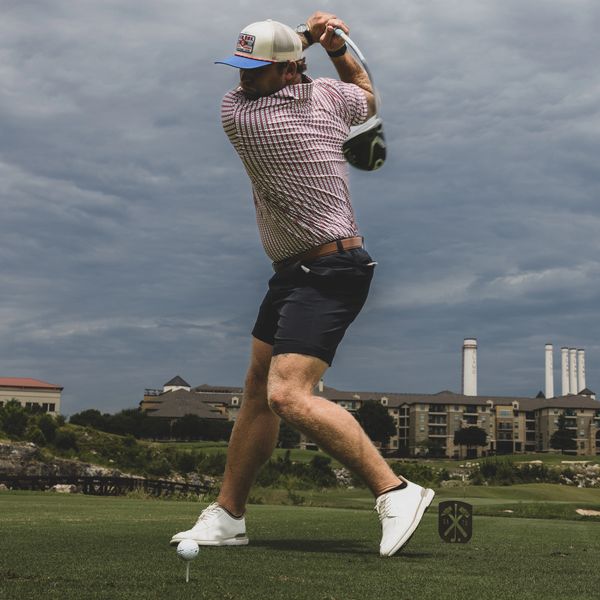 Long drive pro hitting for charity event.